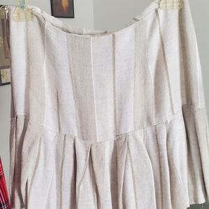 Tan pleated mini skirt